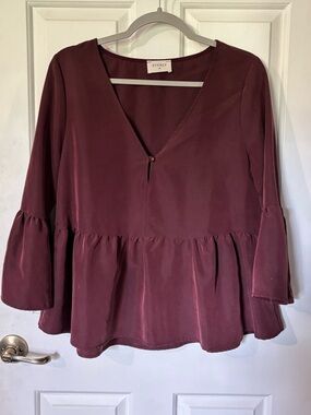 Everly Women's Plum V-Neck Peplum Top. Bell sleeves, ruffle bottom. So soft!